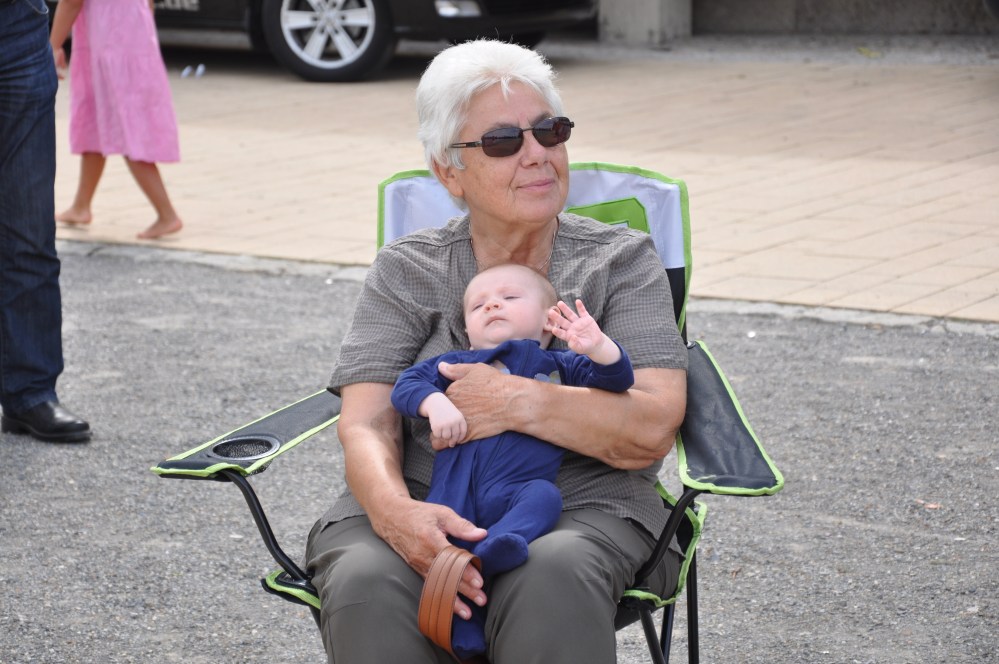 Who is holding my son?