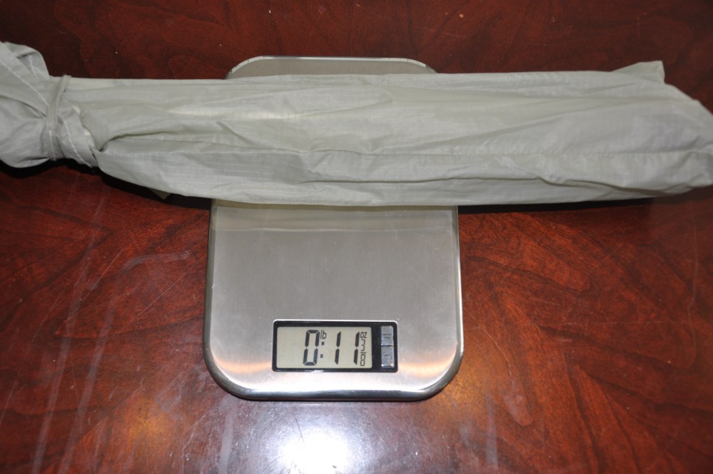 Aluminum poles in bag weigh 11 ounces.